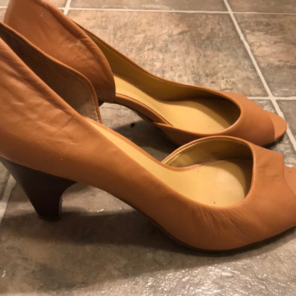 Tan open toe pumps